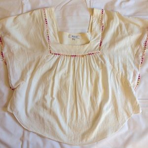 Madewell white flowy cropped top with colorful Pom poms